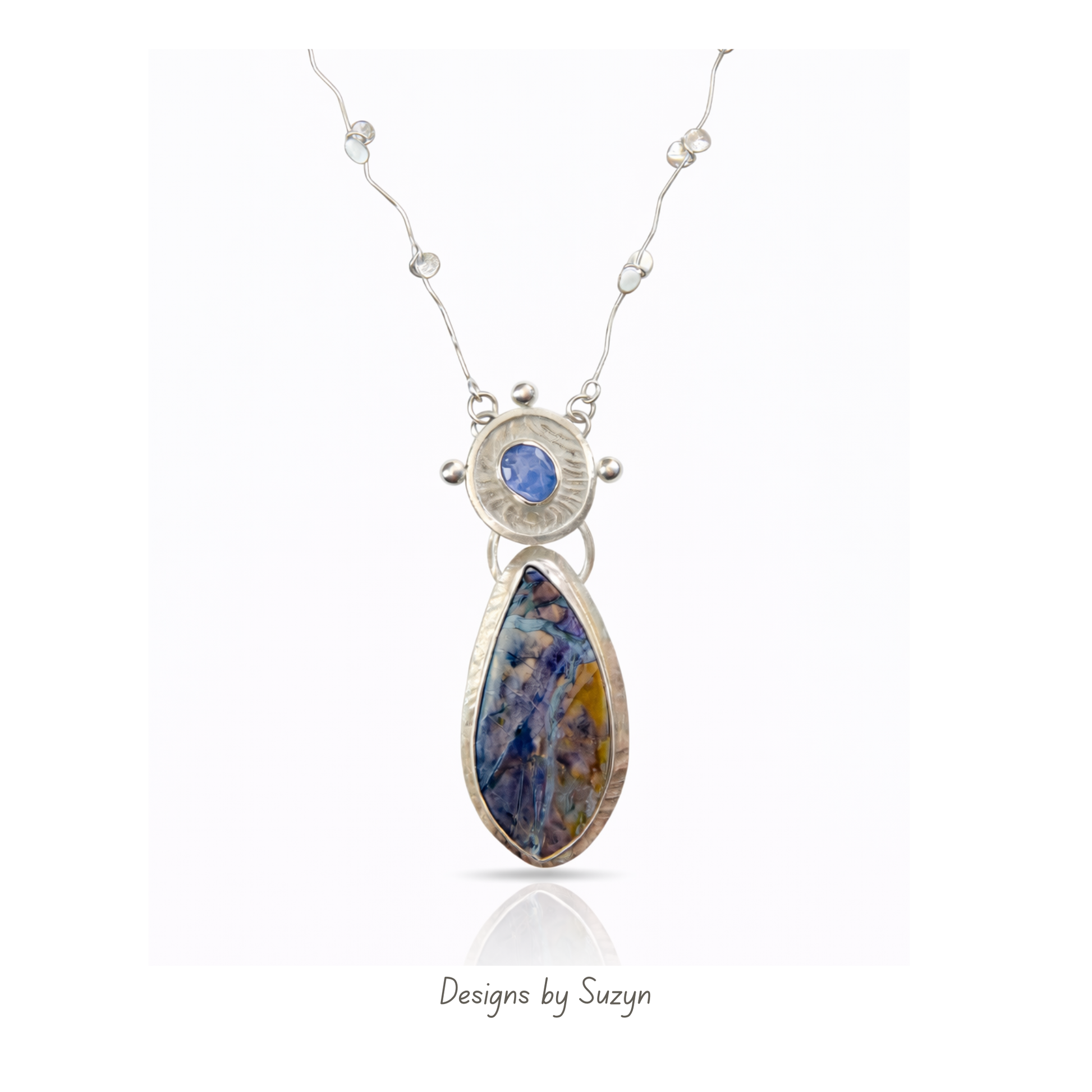 Hand-forged Argentium silver statement necklace with tanzanite and Tiffany stone Passion, one of a kind artisan jewelry, Designs by Suzyn