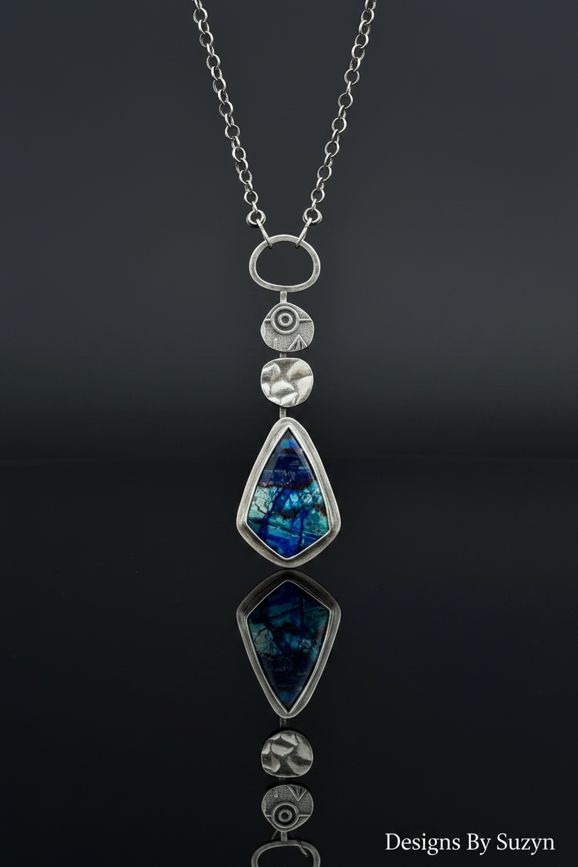 Bluebird Azurite pendant necklace studio shot with mirror reflection on dark grey surface
