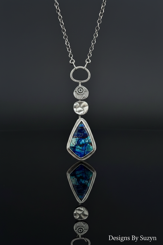 Bluebird Azurite pendant necklace studio shot with mirror reflection on dark grey surface