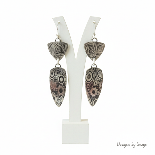 Earrings on white stand