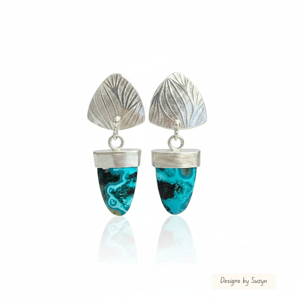 Earrings Standing Upright with Reflection and Logo