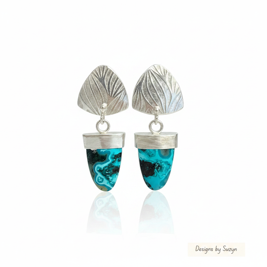 Earrings Standing Upright with Reflection and Logo