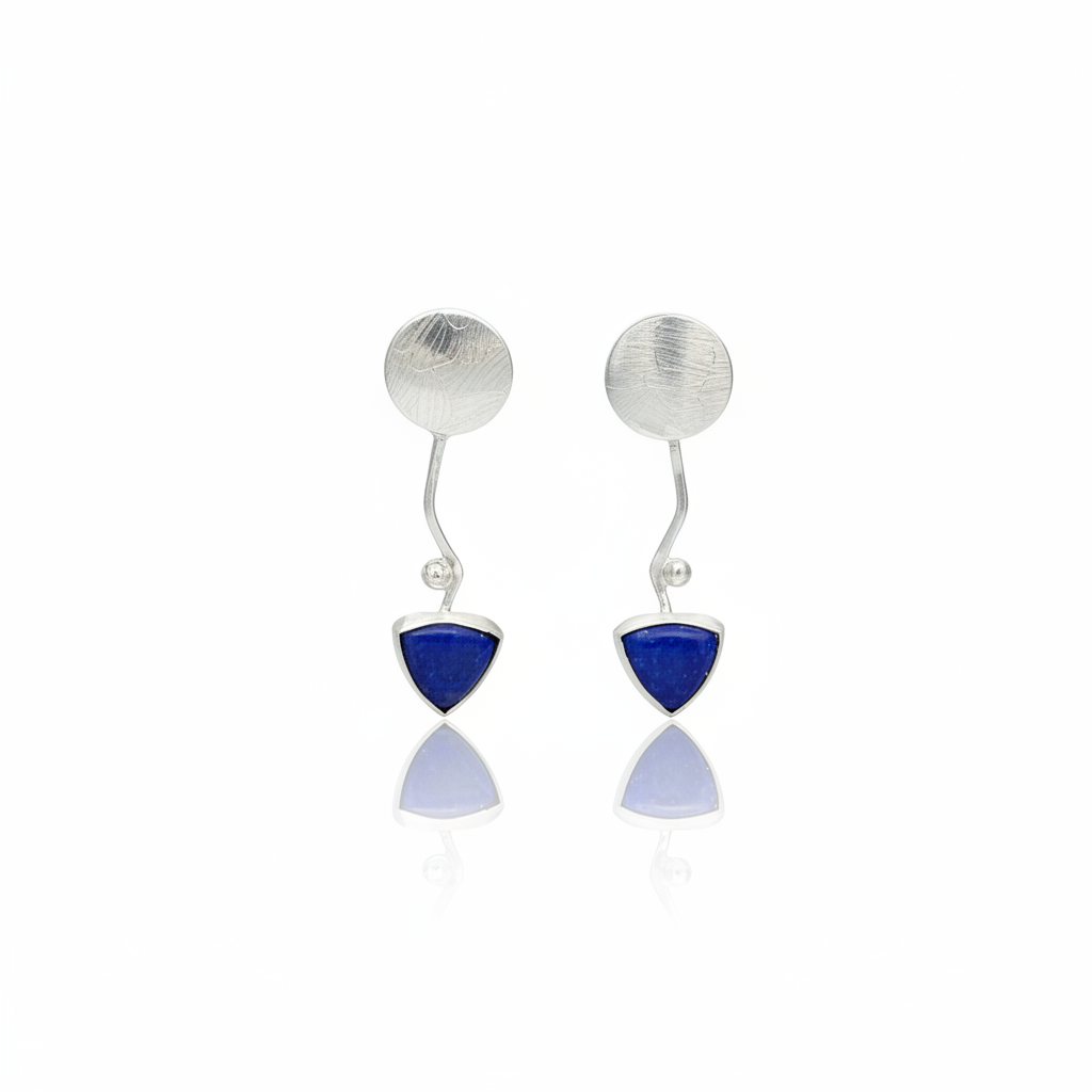 Handcrafted brushed silver post earrings with triangular labradorite drops on white background