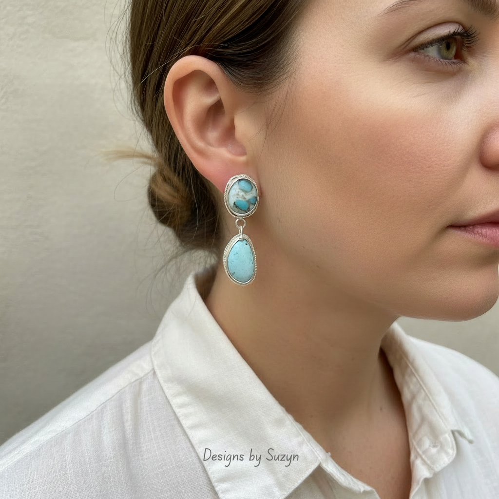 Handcrafted Golden Hills turquoise and Argentium silver dangle earrings worn by model, one of a kind artisan jewelry, Designs by Suzyn