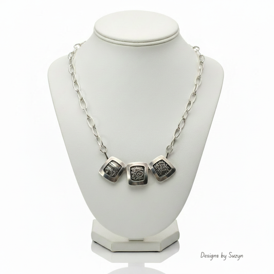 Three-Panel Silver Necklace on Bust with Watermark